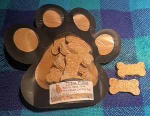 Tuna Fudge treats contain: tuna, Parmesan cheese, flax seed, oatmeal flour and water.