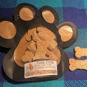 Tuna Fudge treats contain: tuna, Parmesan cheese, flax seed, oatmeal flour and water.