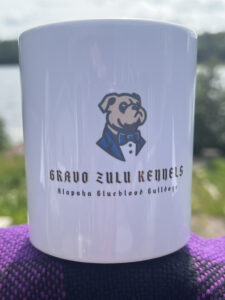 Coffee mug with 11-oz capacity and is dishwasher and microwave safe.